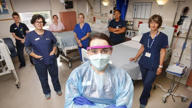 Karlee Robson with Amina King, Heidi Metcalf, Jess Gebbie, Imelda Corcoran, Gian Espina and Barbara Franczak in the Infectious Disease ward at Royal Melbourne Hospital. Picture: David Caird