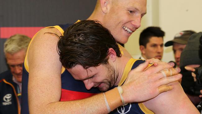 Big fan ... Sam Jacobs with Patrick Dangerfield after the Crows’ Showdown win. Picture: Calum Robertson