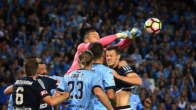 Danny Vukovic punches clear from a corner during the to keep Sydney FC alive. Picture: Mark Evans