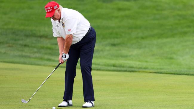 Mr Trump was playing golf when the alleged would-be shooter was apprehended. Picture: Mike Stobe/Getty Images via AFP