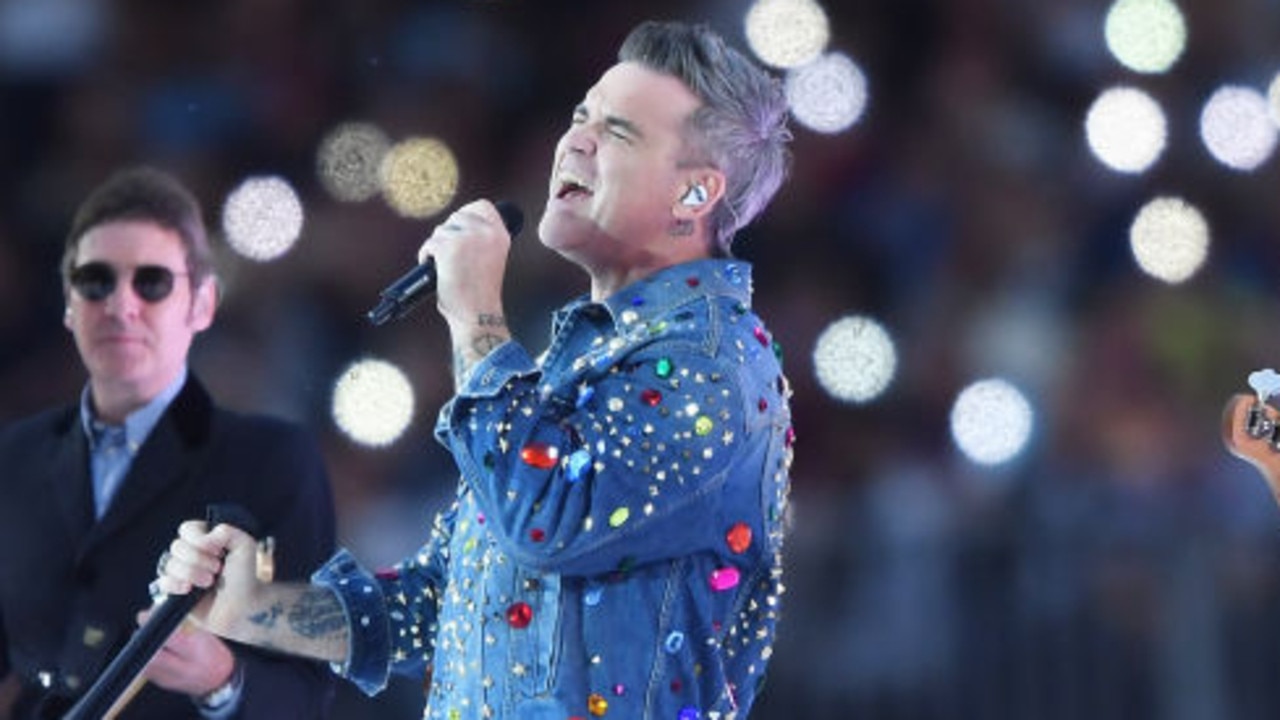 LONDON, ENGLAND - JUNE 12: Robbie Williams performs at half time during the Soccer Aid for Unicef 2022 match between Team England and Team World XI at London Stadium on June 12, 2022 in London, England. (Photo by Alex Davidson/Getty Images)