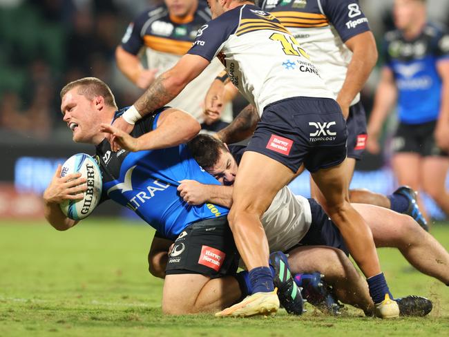 PERTH, AUSTRALIA - MAY 20: Tom Robertson of the Force gets tackled during the round 13 Super Rugby Pacific match between Western Force and ACT Brumbies at HBF Park, on May 20, 2023, in Perth, Australia. (Photo by James Worsfold/Getty Images)