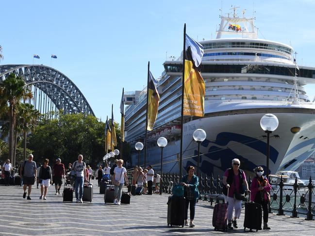 Cruise ship passengers disembark from the Ruby Princess at Circular Quay in Sydney on Thursday. Picture: AAP/Dean Lewins