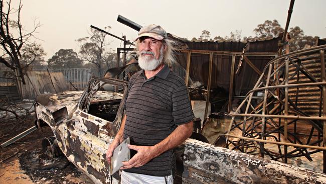 Ralph Graham-Emerson with the ruins of his collection. Picture: Adam Yip