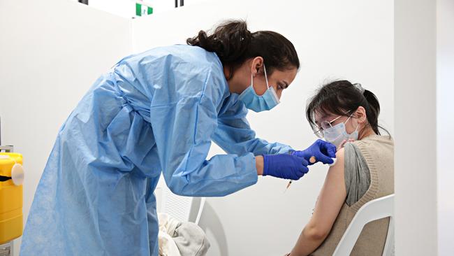 282 cases, 1 death; NSW hits 85 per cent