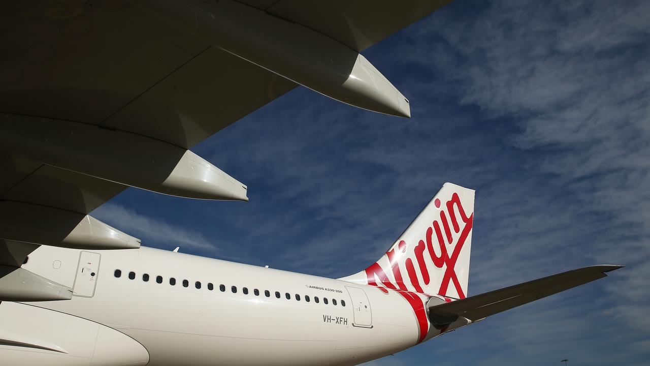 Virgin Australia is one of the many airlines promoting their cleaning procedures on board planes. Picture: Brendon Thorne/Bloomberg