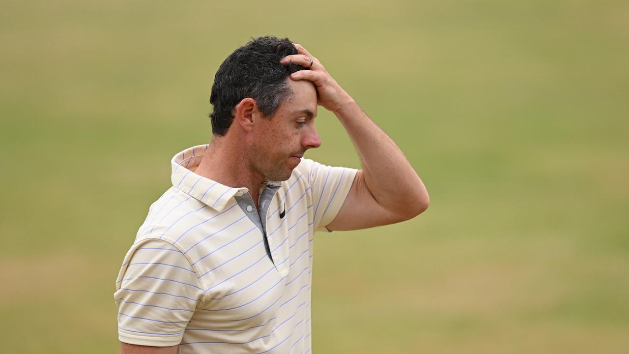 ST ANDREWS, SCOTLAND - JULY 17: Rory McIlroy of Northern Ireland looks dejected on the 18th green during Day Four of The 150th Open at St Andrews Old Course on July 17, 2022 in St Andrews, Scotland. (Photo by Ross Kinnaird/Getty Images)