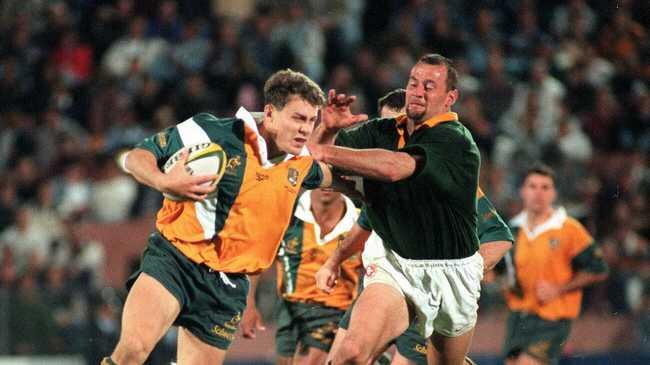 TGS old boy Jason Little defends the ball in an Australia v South Africa, Tri-Nations Test at Suncorp Stadium in 1997.