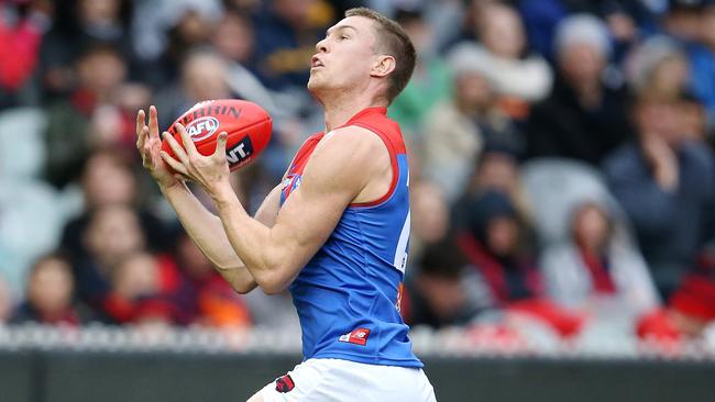 Tom McDonald marks running back with the flight of the ball. Picture: Michael Klein