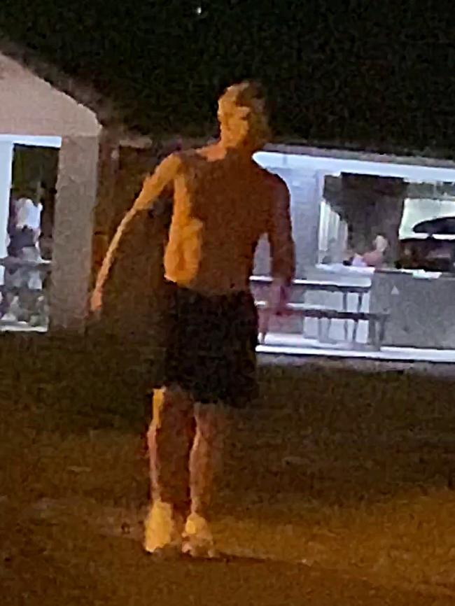 Clarke appears shirtless during the Noosa blow-up.