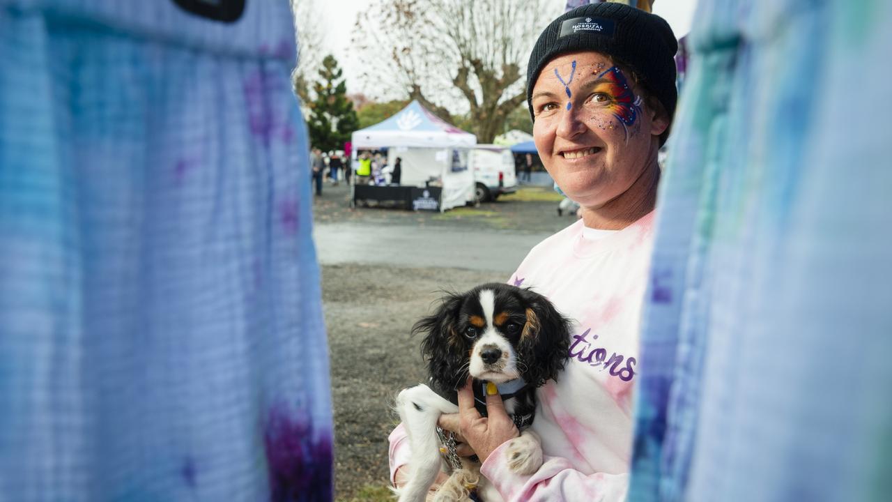 Pauline Drury, wife of organiser Billy Drury, holding Archie in her Bellafly Creations stall at the Something About Bella – Bella's Birthday Fundraiser for Toowoomba Hospital Foundation, Sunday, June 4, 2023. Picture: Kevin Farmer