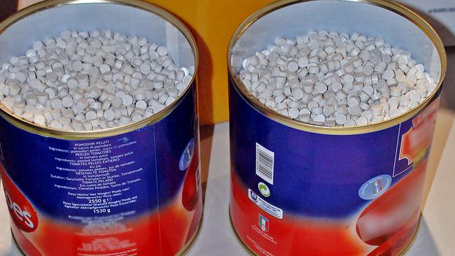 Australian Customs display some of the seized 4.4 tonnes of ecstasy tablets in Melbourne.