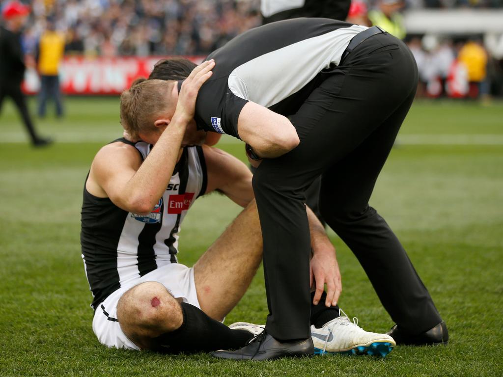 Nathan Buckley and Brodie Grundy. (Photo by Darrian Traynor/AFL Media/Getty Images)