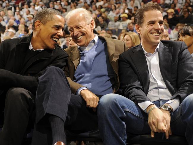 Then US President Barack Obama shares a laugh with Vice President Joe Biden and Biden’s son Hunter Biden. Picture: Mitchell Layton