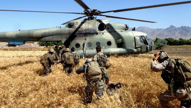 Australian soldiers board a helicopter in Afghanistan’s Oruzgan province in 2011. Picture: Department of Defence