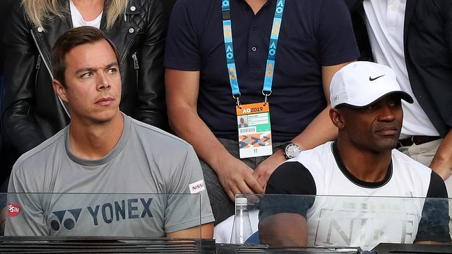 Coach Sascha Bajin (left) watches on from Naomi Osaka’s player box in 2019.