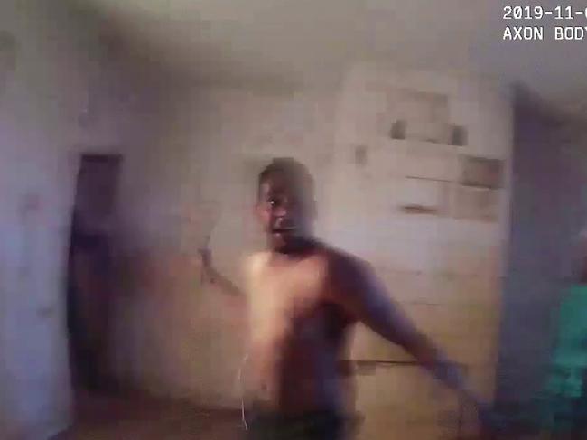 NT Police body-cam footage showing Kumanjayi Walker threatening police with an axe the day before he was shot by police officer Zachary Rolfe.