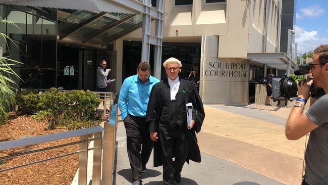 Daine Robert Johnson leaving court with barrister Jason Buckland.