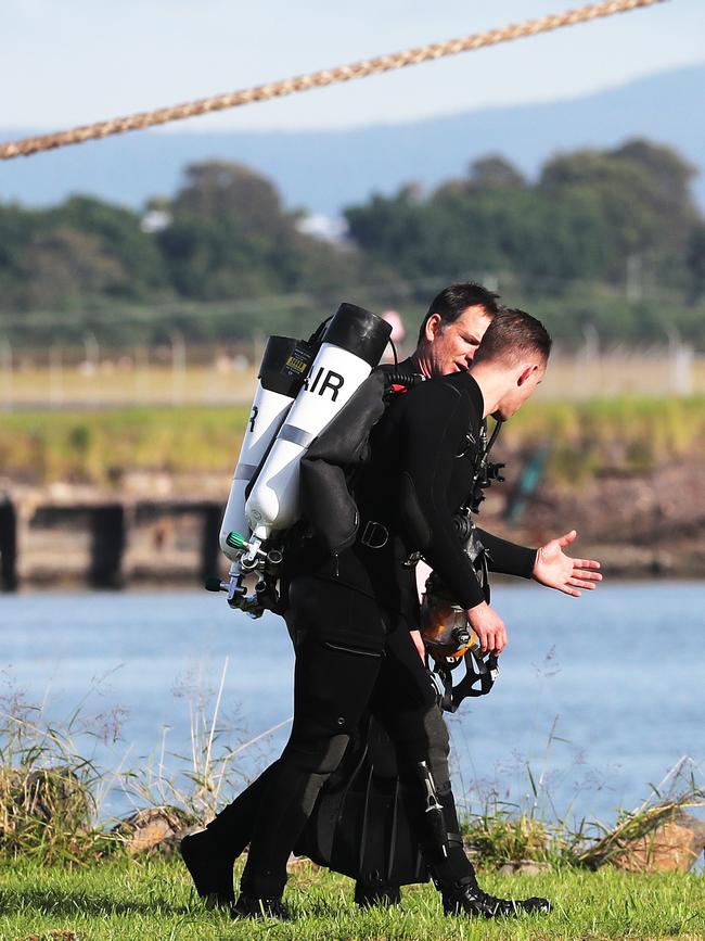 Police divers at the scene at the Port of Newcastle. Picture: Peter Lorimer