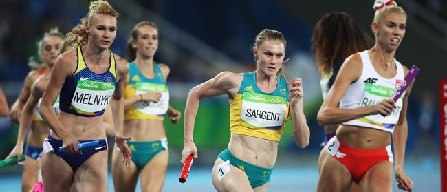 Caitlin Sargent takes baton from Annelise Rubie in of Australia in Rio.  Picture. Phil Hillyard