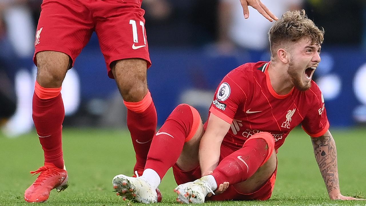 LEEDS, ENGLAND - SEPTEMBER 12: Harvey Elliott of Liverpool reacts as he looks to be injured as Mohamed Salah of Liverpool calls for medical attention during the Premier League match between Leeds United and Liverpool at Elland Road on September 12, 2021 in Leeds, England. (Photo by Laurence Griffiths/Getty Images)