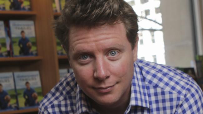 Author Scott Pape poses for a photograph at the launch of his new book "Barefoot Investor for Families" at the State Library in Melbourne, Monday, September 24, 2018. (AAP Image/Wayne Taylor) NO ARCHIVING