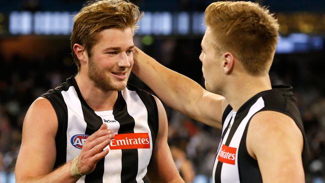 Rupert Wills is congratulated by Jordan De Goey after the win over West Coast.