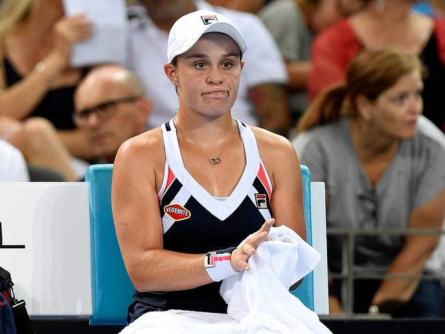 BRISBANE, AUSTRALIA - JANUARY 01:  Ashleigh Barty of Australia looks dejected during her match against Lesia Tsurenko of Ukraine during day two of the 2018 Brisbane International at Pat Rafter Arena on January 1, 2018 in Brisbane, Australia.  (Photo by Bradley Kanaris/Getty Images)