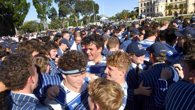 Nudgee players and supporters celebrate the 2021 win. Picture, John Gass