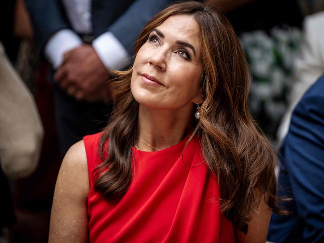 Queen Mary of Denmark looks up during the opening of the Danish pavilion at the Maison du Danemark on the Champs-ElysÃ©es in Paris, France, during the Paris 2024 Olympic Games on July 25, 2024. (Photo by Mads Claus Rasmussen / Ritzau Scanpix / AFP) / Denmark OUT