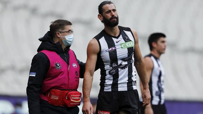 Brodie Grundy suffered a neck injury during the match. Picture: AFL Photos/Getty Images