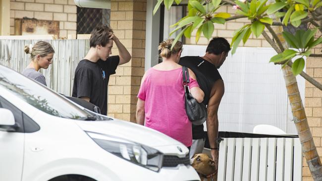 People attend a house at Iluka Ave at Buddina where a 16-year-old boy was allegedly stabbed to death on Thursday night. Picture: Lachie Millard