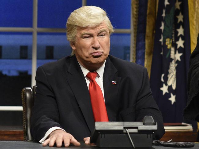 This Feb. 4, 2017 photo released by NBC shows Alec Baldwin as President Donald Trump in the opening sketch of "Saturday Night Live," in New York. With the return of John Oliver to HBO and Alec Baldwinâ€™s guest hosting slot on â€œSaturday Night Live,â€ this is shaping up like a big weekend for late-nightâ€™s treatment of the new president.(Will Heath/NBC via AP)