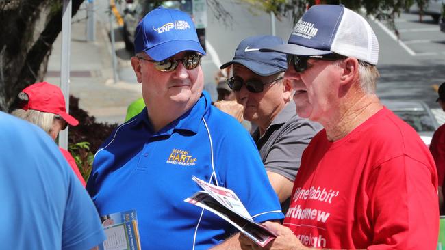 LNP MP Michael Hart and ALP candidate Wayne Bartholomew at prepolling. Picture Glenn Hampson.