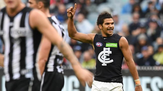 Sam Petrevski-Seton celebrates a goal against Collingwood.