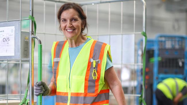 Former teacher Lynda Blake, of Redcliffe, has delayed retirement and works at the Amazon warehouse in Brisbane's Pinkenba. Picture: Supplied