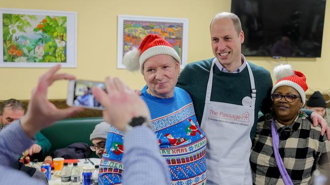 Prince William happily posed with the event’s guests.