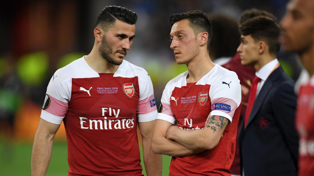 Sead Kolasinac and Mesut Ozil of Arsenal have been targeted by a group of criminals. (Photo by Michael Regan/Getty Images)