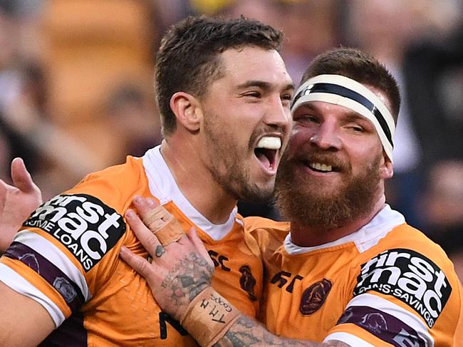 Corey Oates of the Broncos reacts after scoring a try during the Round 25 NRL match between the Brisbane Broncos and the Manly-Warringah Sea Eagles at Suncorp Stadium in Brisbane, Sunday, September 2, 2018. (AAP Image/Dave Hunt) NO ARCHIVING, EDITORIAL USE ONLY