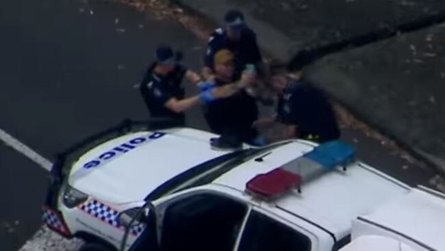 The man taking selfie while being arrested. Picture - Channel 9.