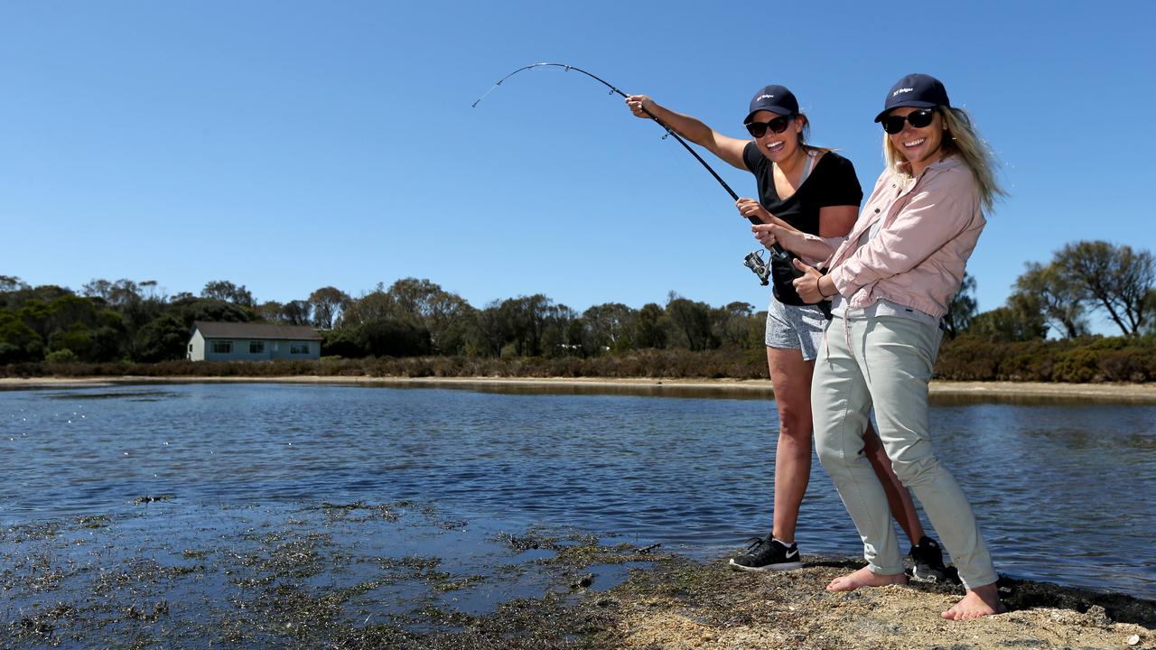 Holly Gillham and Shayleigh Chapman try to hook a fish at the property in 2018. Picture: Mike Dugdale