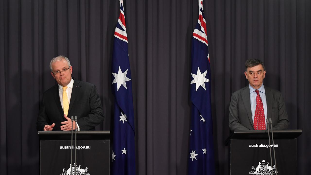 Prime Minister Scott Morrison and Chief Medical Officer Brendan Murphy on Tuesday night. Picture: Sam Mooy/AAP/Getty Pool