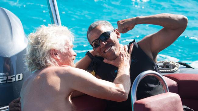 Branson and former US president Barack Obama during a kitesurfing session in the Caribbean. Picture: AFP