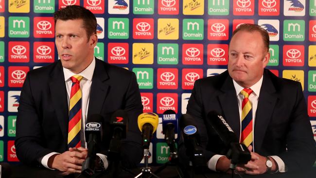 Adelaide Football Club chief executive Andrew Fagan and Crows chairman Rob Chapman discuss their take over of the Adelaide Bite Australian Baseball League team. Picture: AAP Image/Kelly Barnes