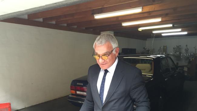 George Polites arrives at his office in Adelaide. Picture: Brad Fleet