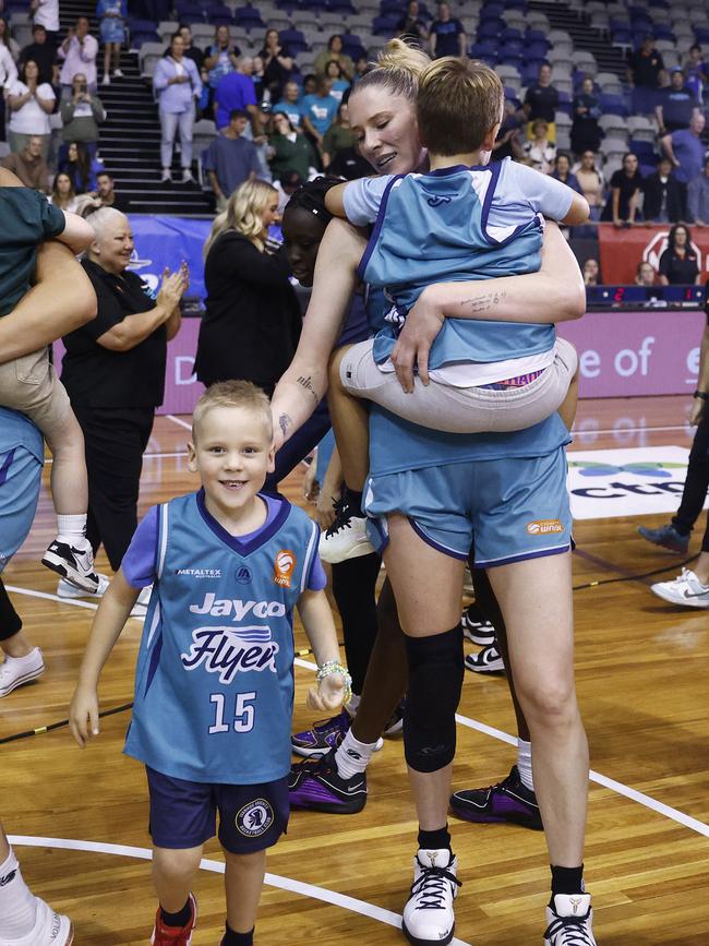 Lauren Jackson celebrates with her children after winning game three of the WNBL Semi Final series. Picture: Getty Images