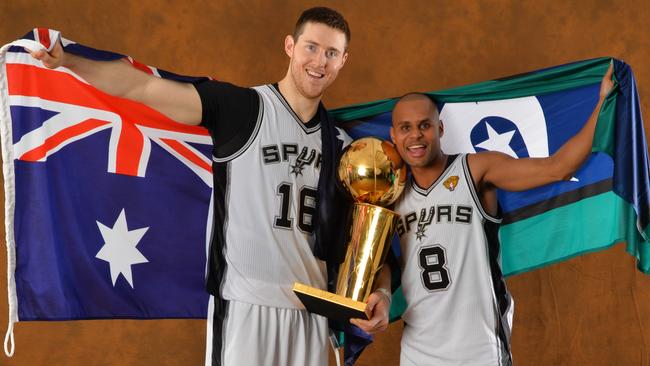 Aron Baynes and Patty Mills of the San Antonio Spurs.