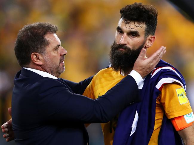 SYDNEY, AUSTRALIA - NOVEMBER 15:  Australia Coach Ange Postecoglou and Mile Jedinak of Australia celebrate victory during the 2018 FIFA World Cup Qualifiers Leg 2 match between the Australian Socceroos and Honduras at ANZ Stadium on November 15, 2017 in Sydney, Australia.  (Photo by Mark Kolbe/Getty Images)