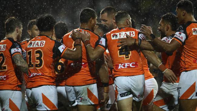 Wests Tigers players celabrate a try against the Panthers. Picture: NRL Photos