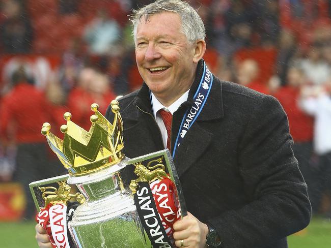 Sir Alex Ferguson with the Premier League trophy in his final season as Manchester United boss. Picture: Tom Purslow/Manchester United via Getty Images